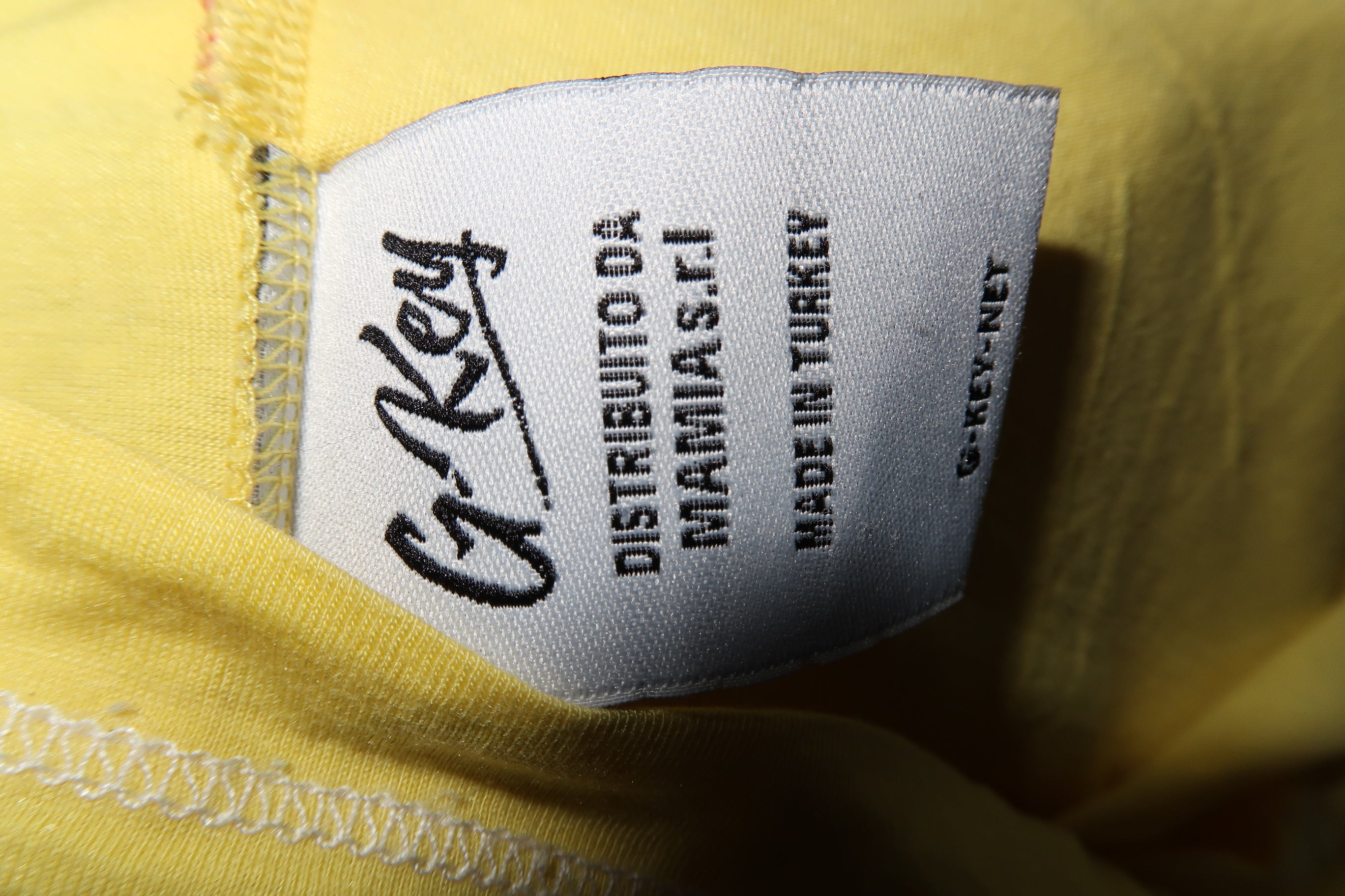 G.Key Graphic Yellow V Neck Shirt